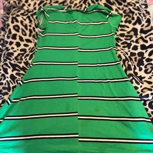 I’m selling a green dress with black and white stripes on it.